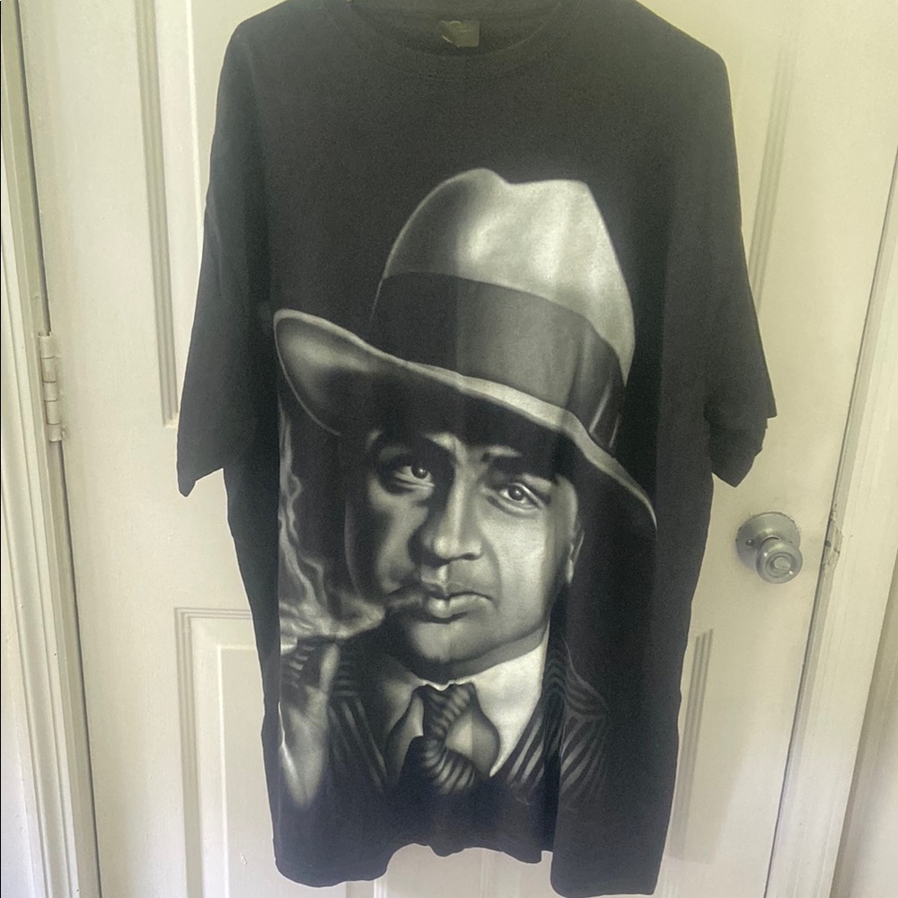 Classic Black Graphic Tee with Iconic Print